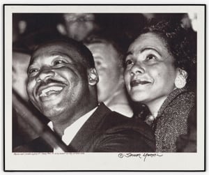 Martin Luther King Jr and his wife at a Sammy Davis Jr concert
